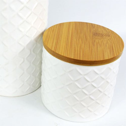 Set of Two Embossed Cream Ceramic Canisters with Lids