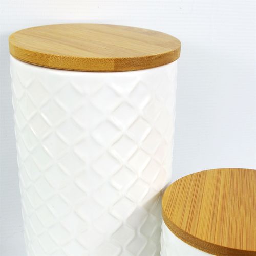 Set of Two Embossed Cream Ceramic Canisters with Lids