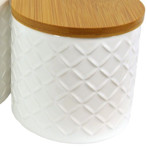 Set of Two Embossed Cream Ceramic Canisters with Lids